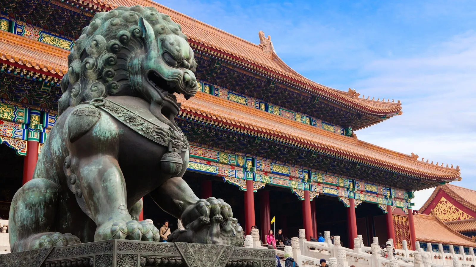 A bronze guardian lion statue before the Hall of Supreme Harmony in Beijing, China.