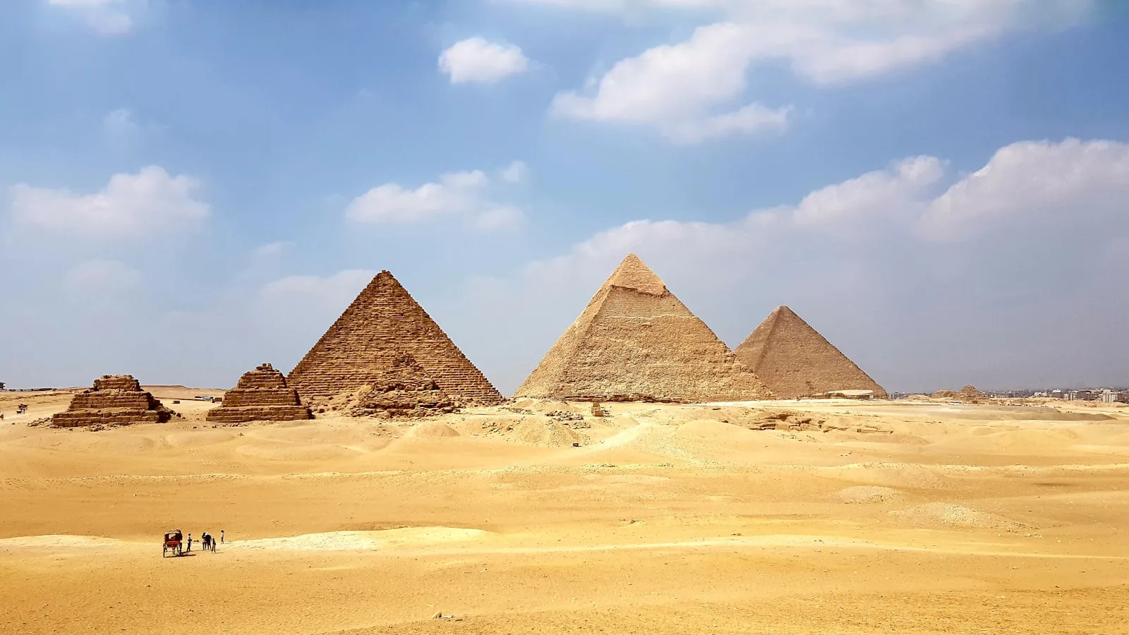 Brown pyramid under blue sky during daytime