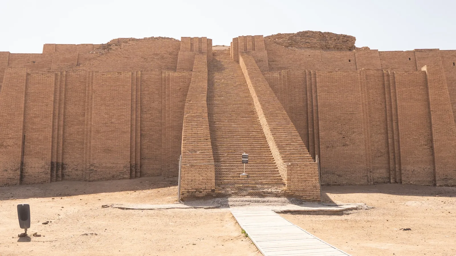 The restored mud-brick facade and central stairway of the Ziggurat of Ur in Dhi Qar, Iraq.