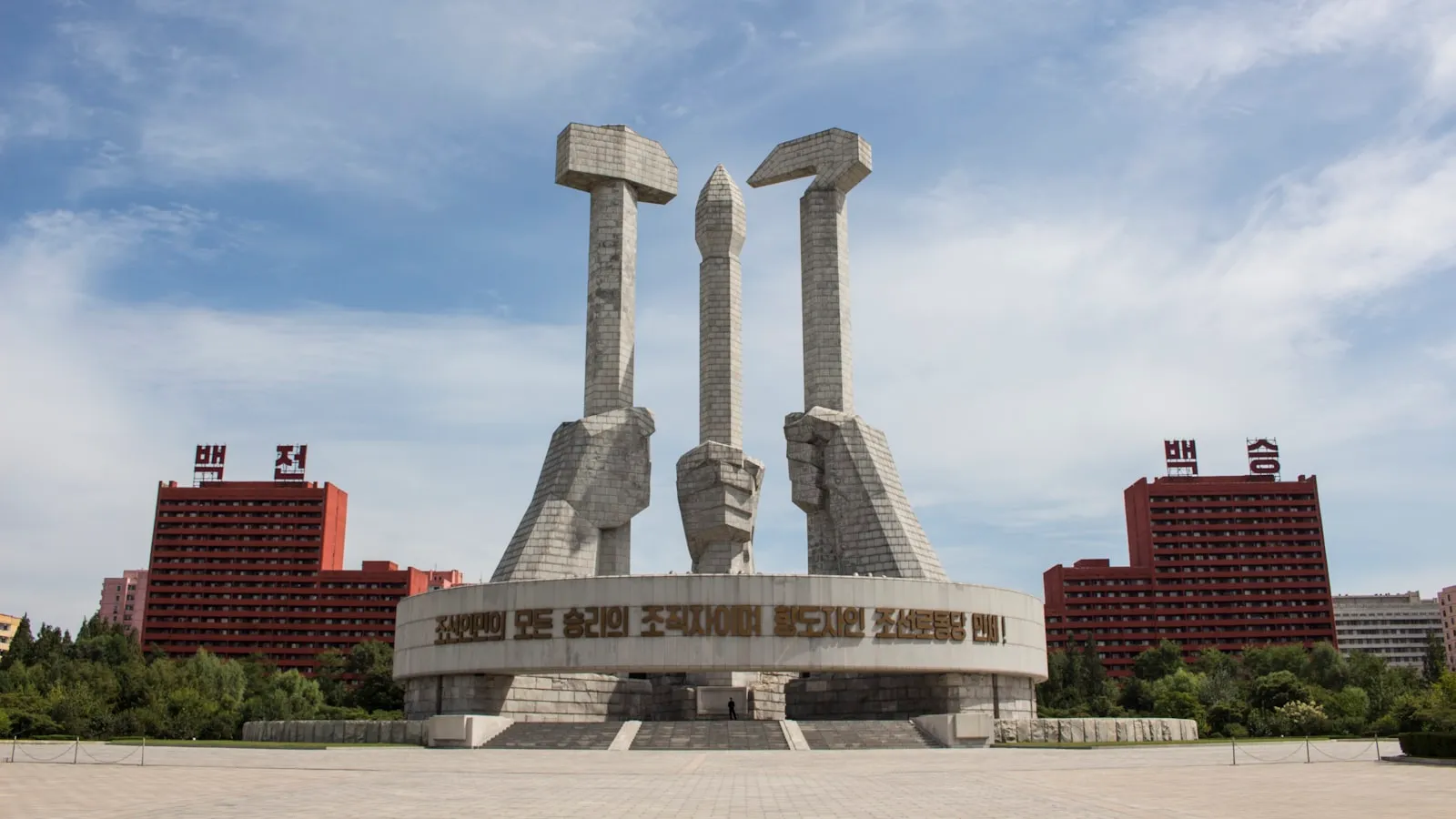 White concrete monument under blue sky during daytime