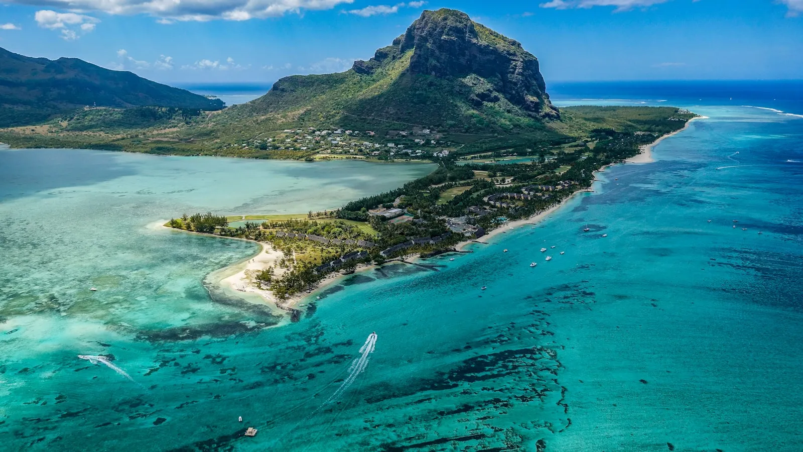 Aerial photography of island beside body of water