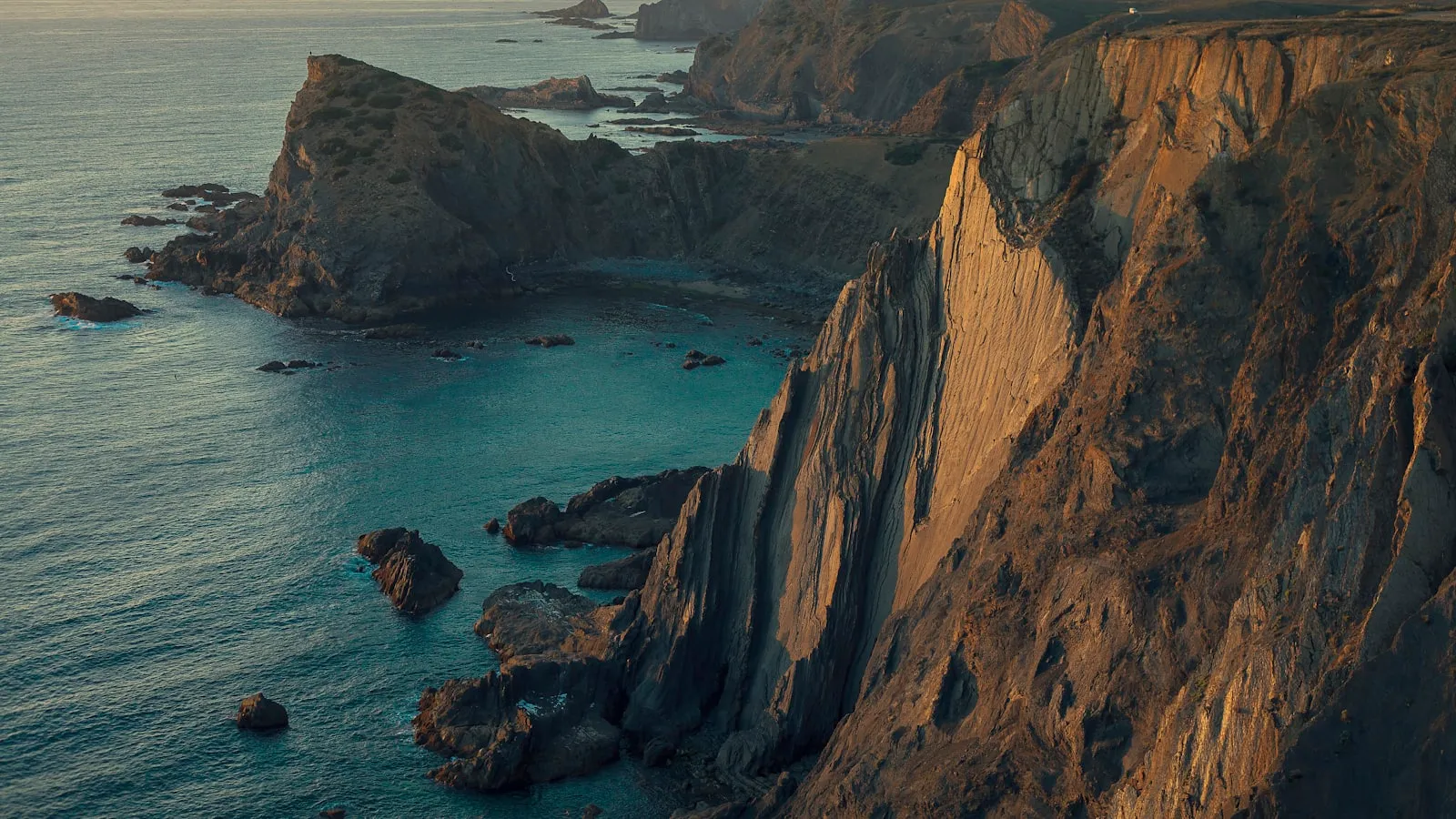 Aerial photography of mountain near sea