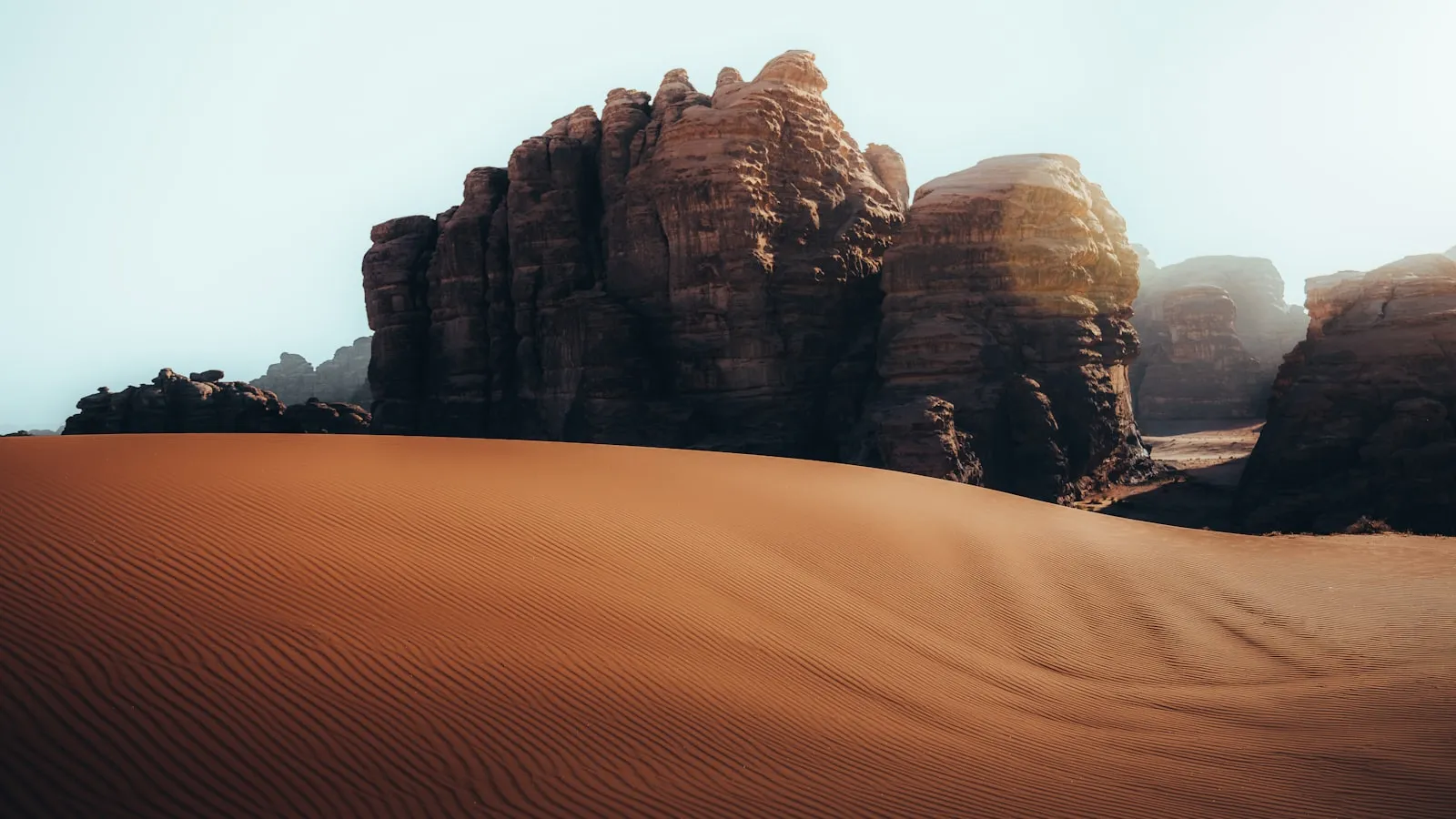 A desert landscape with rocks and sand