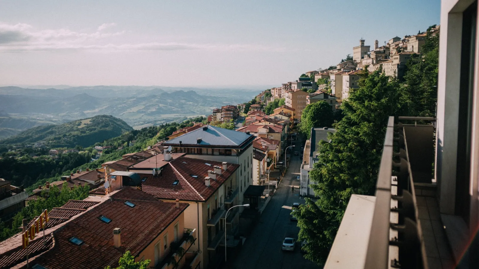 A view of a city with mountains in the background