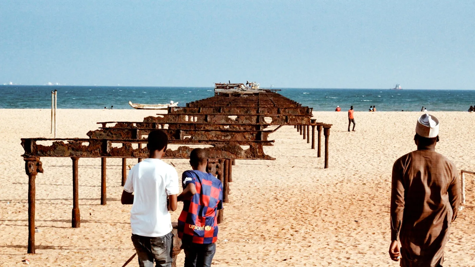 People walking on beach during daytime