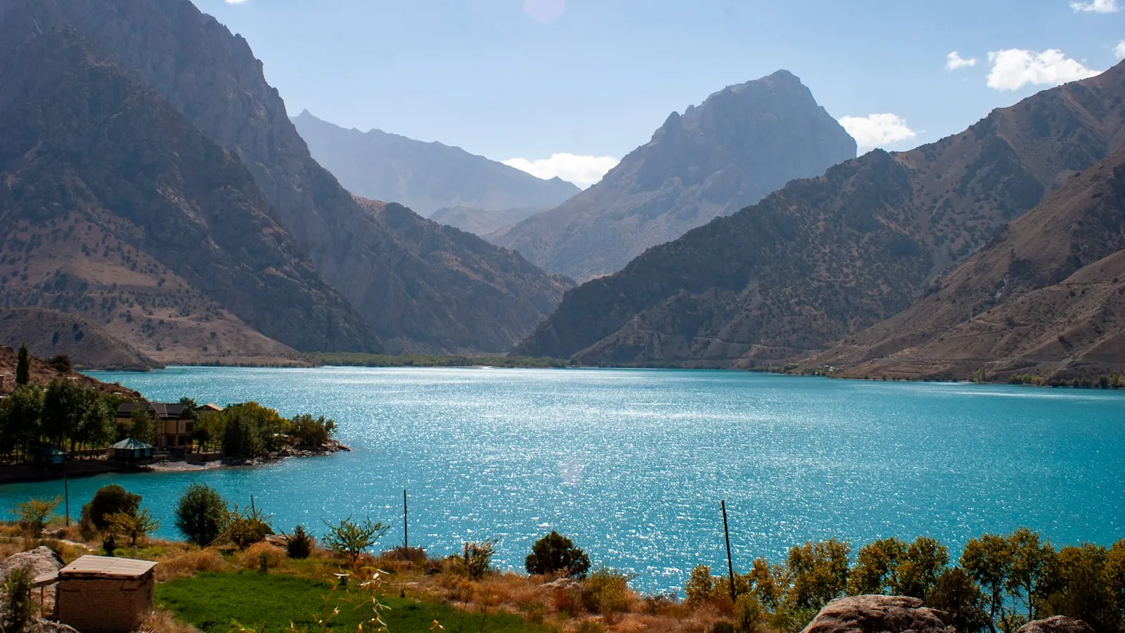 A large body of water surrounded by mountains